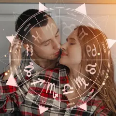 Para, który zastanawia się, jaki znak zodiaku pasuje do skorpiona, otoczony jest kołem zodiaku.