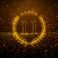 Złoty wieniec laurowy z liczbą 11 i gwiazdkami. Symbolizuje numerologiczną 11 mężczyznę, jego potencjał i drogę.