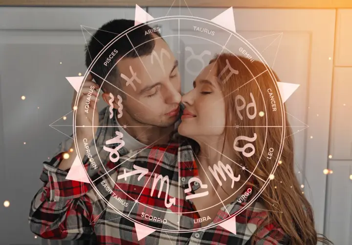 Para, który zastanawia się, jaki znak zodiaku pasuje do skorpiona, otoczony jest kołem zodiaku.
