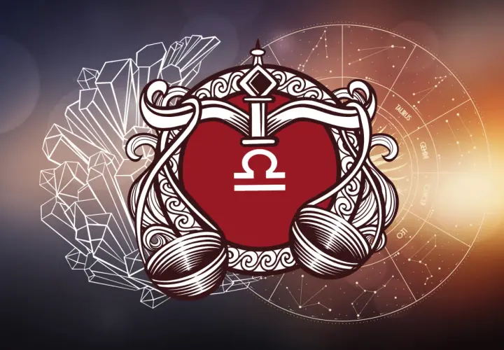Symbol wagi z negatywnymi cechami Raka, otoczony kryształami i zodiakiem.