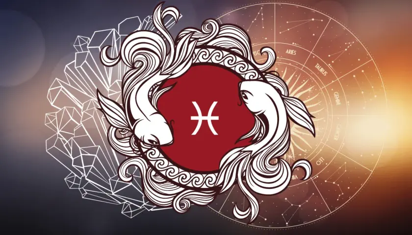 Znak zodiaku Ryby (od 19 lutego do 20 marca) przedstawiony jako dwie ryby w ozdobnej ramce, na tle koła zodiaku i kryształów.